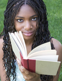 College student reading psychology self-help book